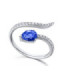 White gold ring with  blue Sapphire and Diamonds