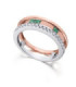 White and rose gold ring with Emeralds and Diamonds