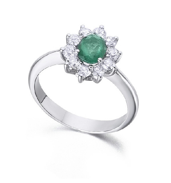 Anillo oro blanco  con diamantes y esmeralda