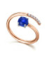 White and rose gold ring with blue Sapphire and Diamonds