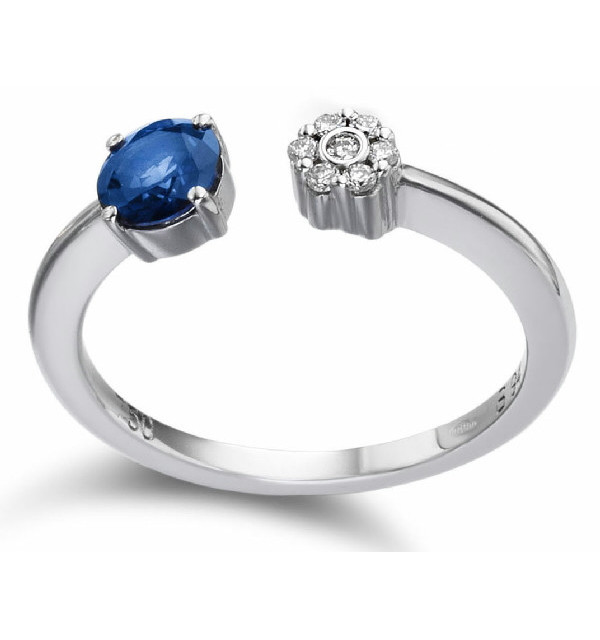 White gold ring with  blue Sapphire and Diamonds
