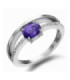 White gold ring with purple Sapphire and Diamonds