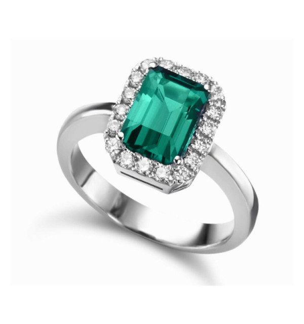 White gold ring with Emerald and halo Diamonds