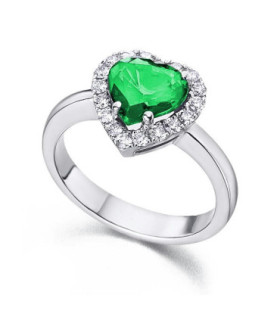 Anillo de  oro blanco con Diamantes y Esmeralda.