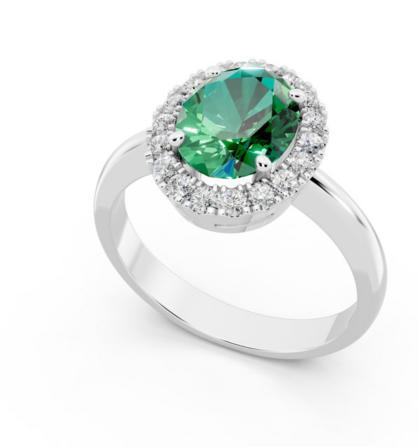 Anillo de  oro blanco con Esmeralda y orla de Diamantes